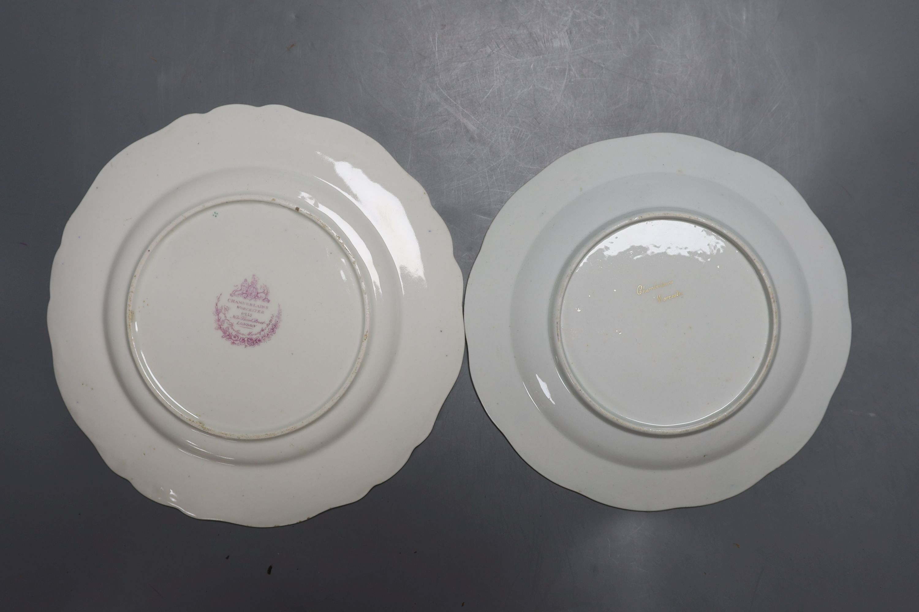 A Chamberlains Worcester armorial plate, a Worcester pinecone pattern plate, c.1775 and a Chamberlains Worcester chinoiserie plate (3) largest 27cm diameter